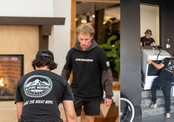 Movers handling appliances and working indoors.