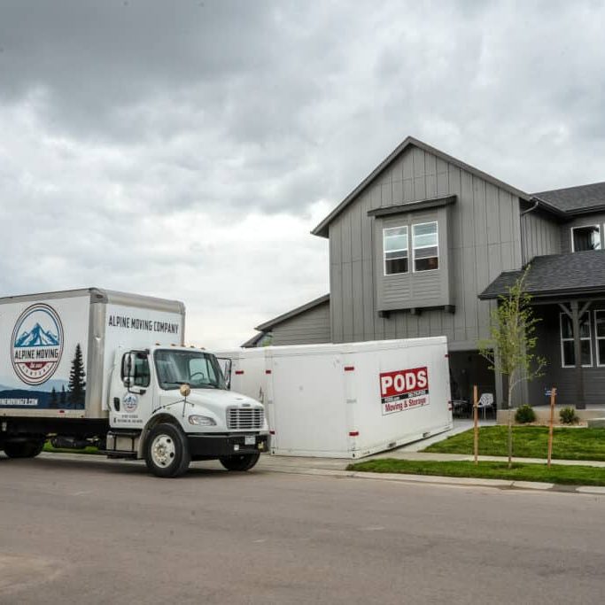 two alpine local moving trucks